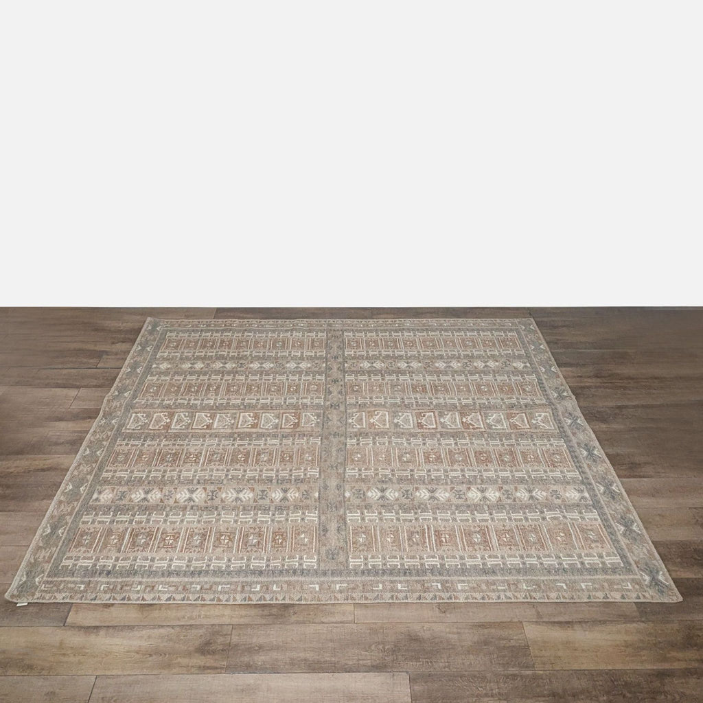 A large rectangular Citizenry rug with intricate geometric patterns, handwoven from 100% New Zealand wool.  