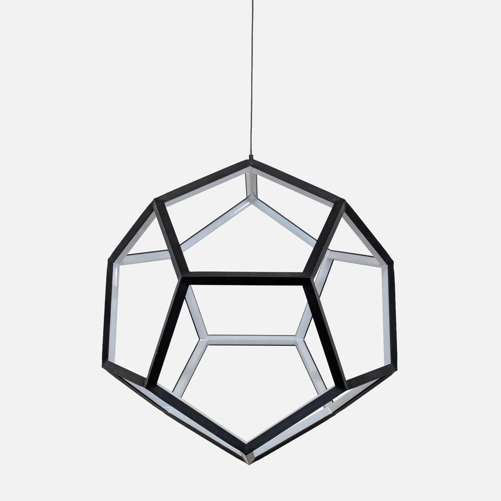 1. Modern geometric pendant light by ET2, featuring steel and acrylic, with a black polygonal frame, dimmable.  