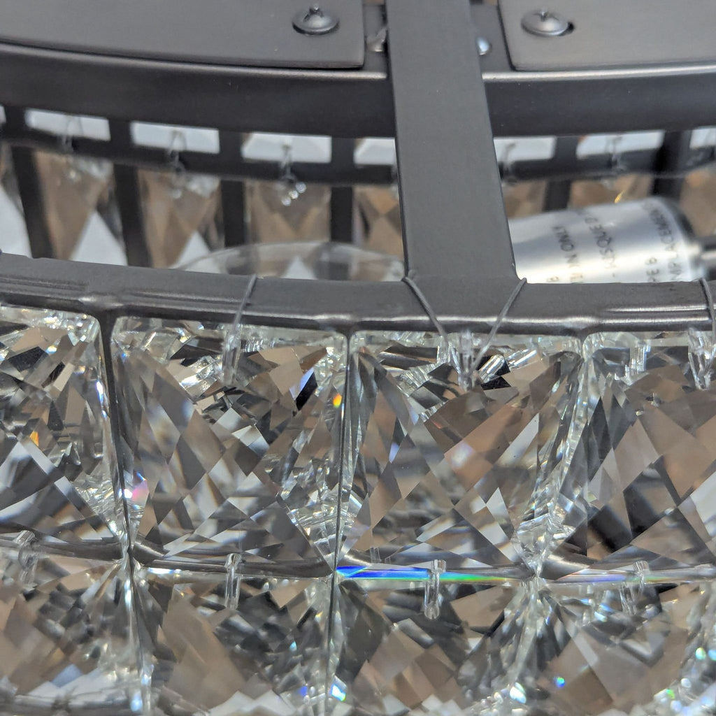 2. Close-up of Reperch ceiling light showing detailed crystal design and metal frame for luxurious lighting effect.