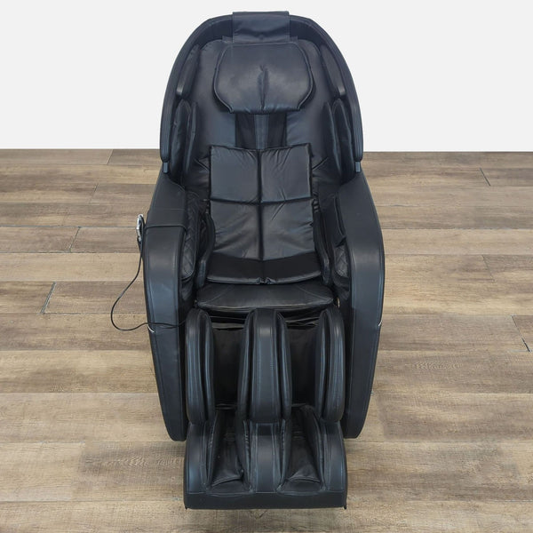 1. Black Daiwa Legacy 4 massage chair with multiple pads, 3D rollers, and extendable leg rest on wooden floor.