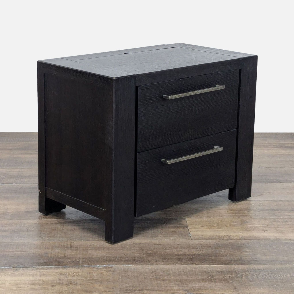 3. Angled view of Metropolitan Home end table, two drawers closed, dark wood, and sleek contemporary handles.