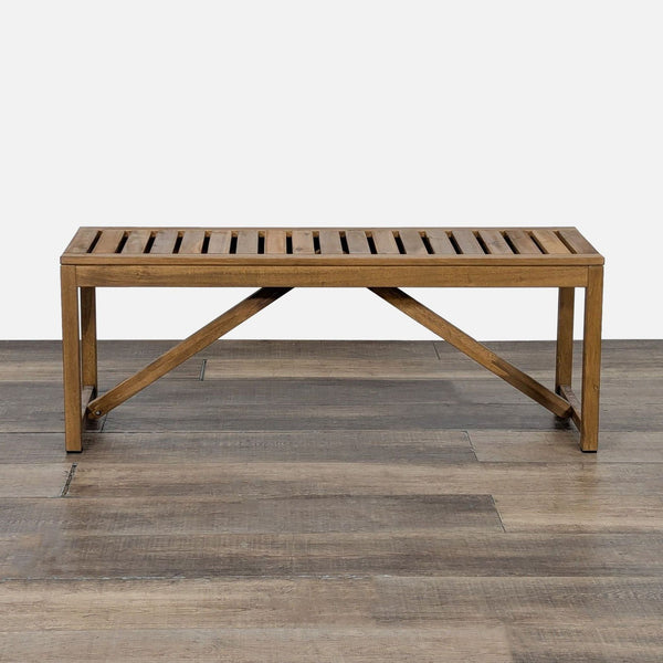 1. Ikea wooden bench in acacia, slatted design, rectangular, photographed from the front on a wood floor.