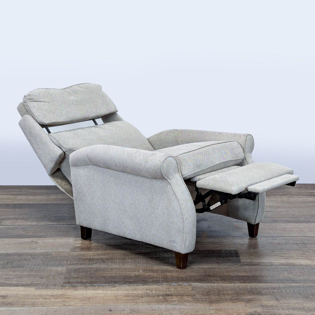 2. Side view of the Comfort Design recliner in a fully reclined position, showing extended footrest and headrest.