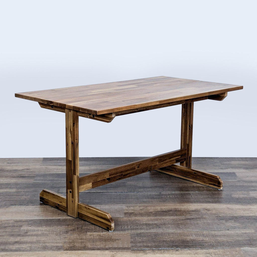 2. Rectangular Shaker-inspired IKEA dining table in acacia wood, features central legs for extra seating, traditional style.