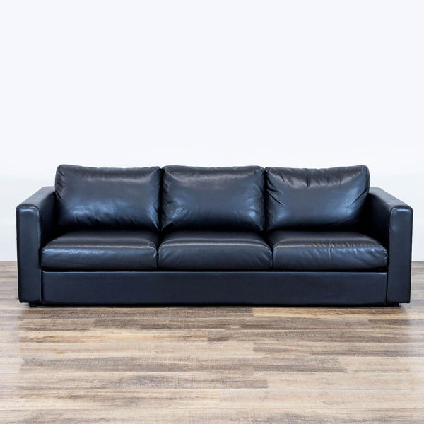1. Black leather Ikea 3-seat sofa with pocket spring cushions, high resilience foam, and wadding, front view.