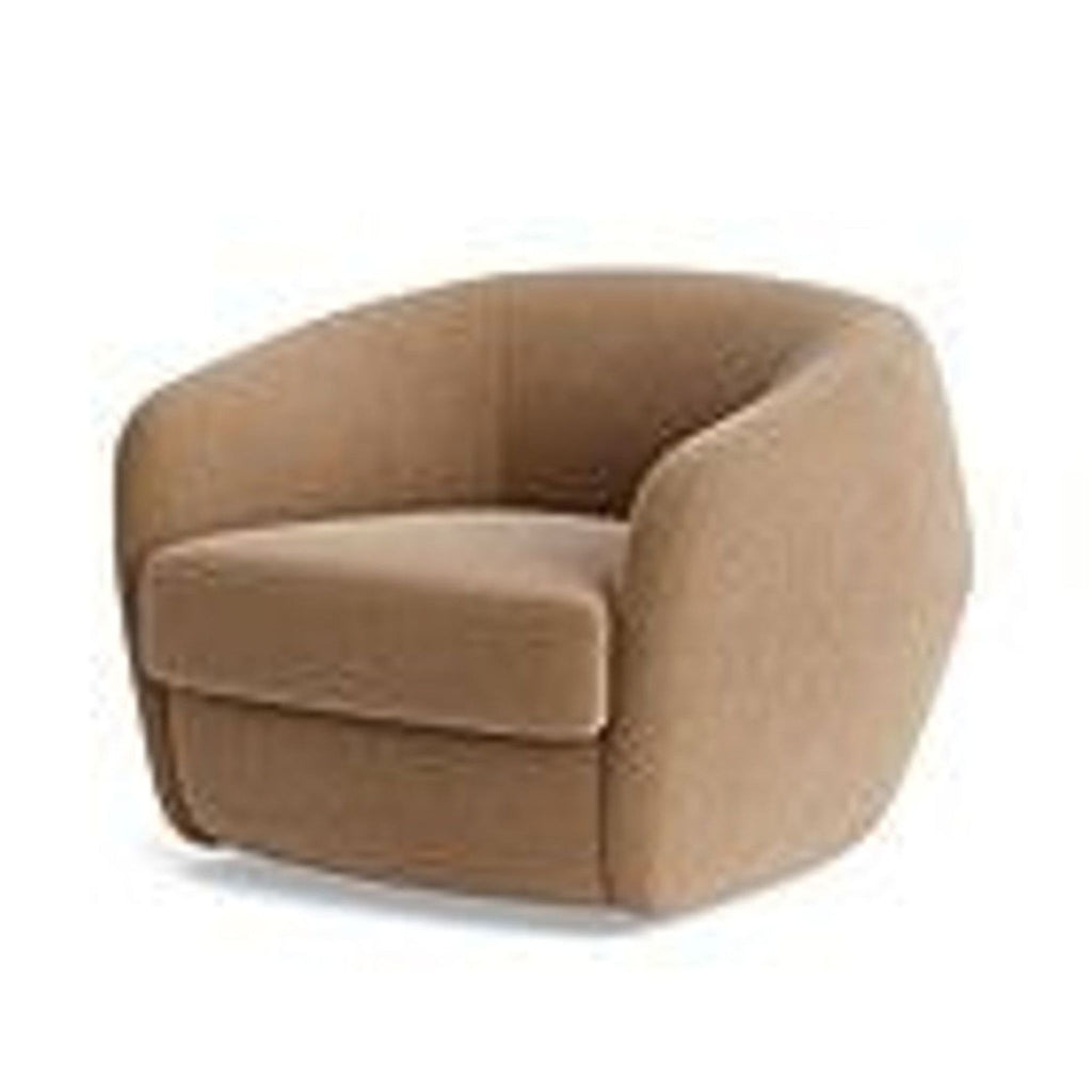 2. Angled side view of a velvet-upholstered barrel back lounge chair from BenchMade Modern.  