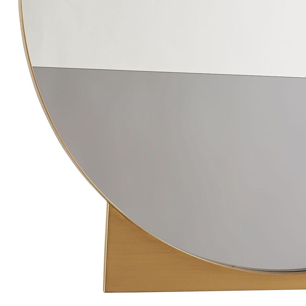3. Close-up of the Datum mirror’s smoke glass and brass wedge base, highlighting its unique geometric style.