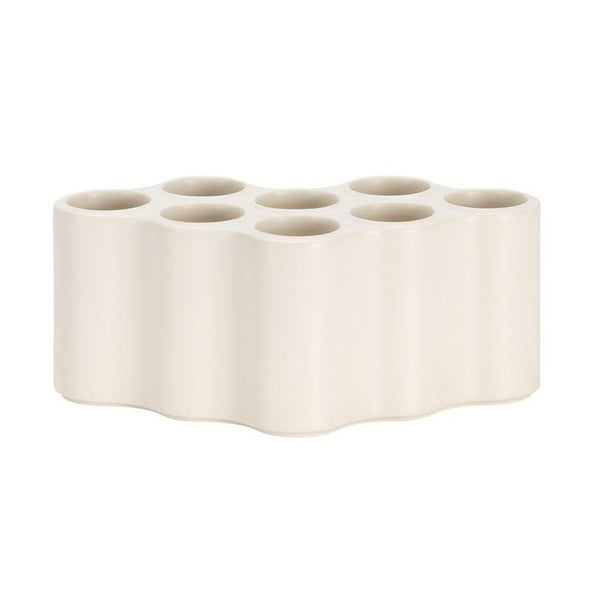 Handcrafted Vitra vase by Ronan & Erwan Bouroullec, featuring eight individual cylindrical tubes.