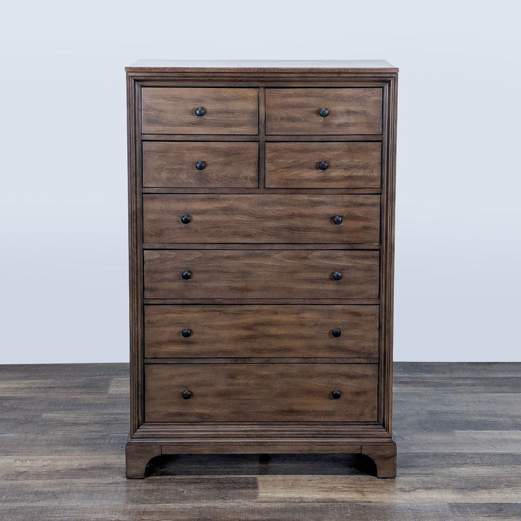 1. Brown Crescent Fine Furniture dresser with simple pewter knobs and rounded corners, shown from the front.