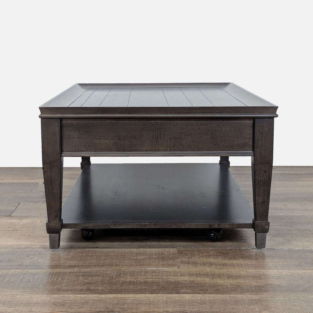 3. Side view of La-Z-Boy coffee table featuring solid wood frame, planked top, and spacious lower shelf on casters.