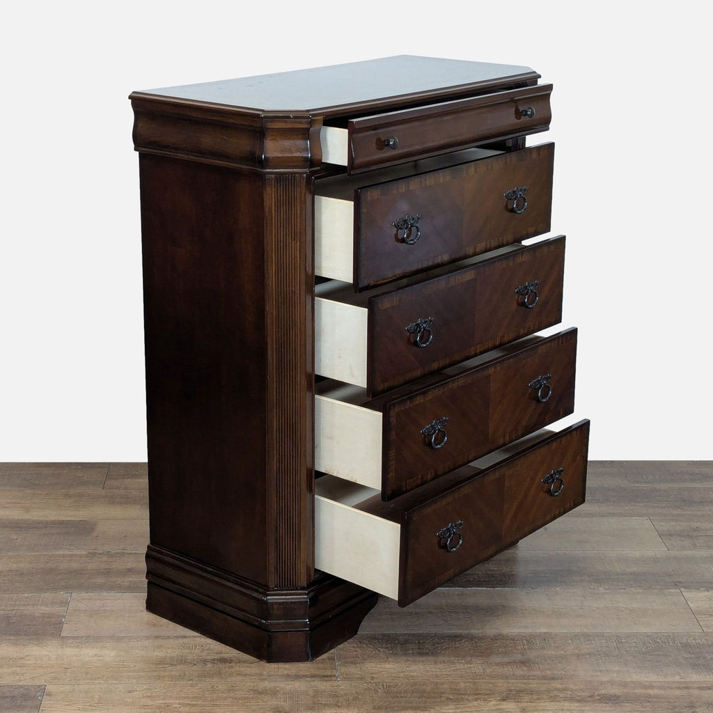 2. Classic Ashley dresser with all drawers open, showing light interiors and antique bronze handles.  