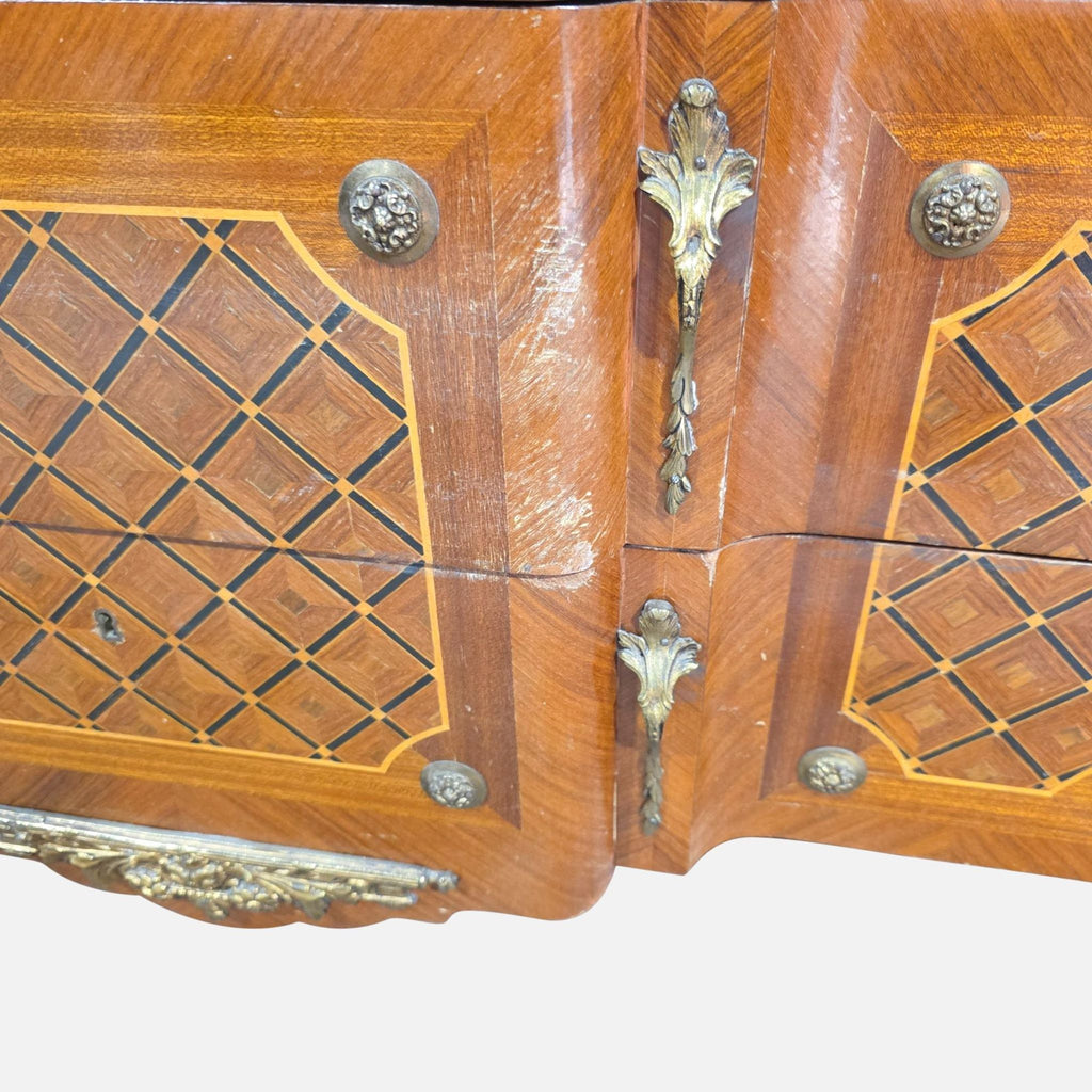 3. Close-up of the Reperch sideboard’s intricate marquetry, ormolu gilding, and wood texture details.