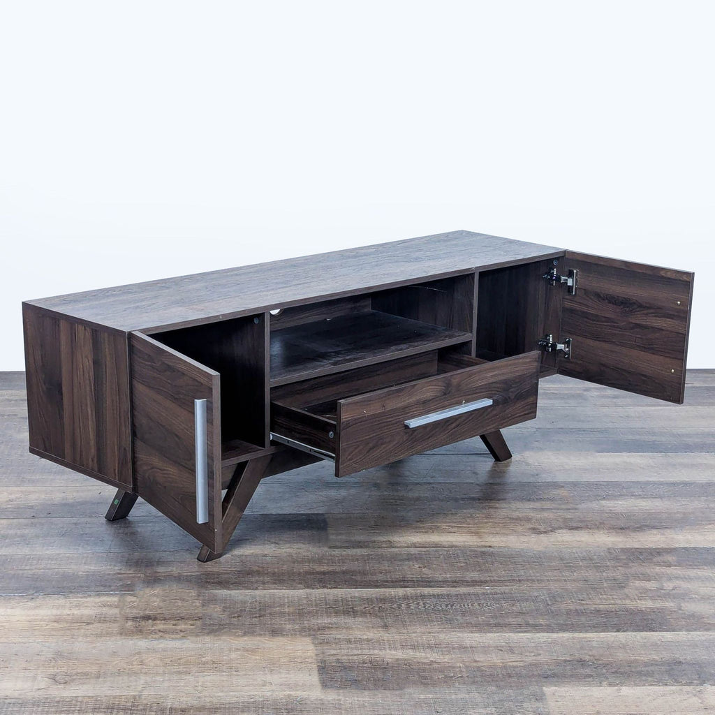 2. Angled view of Reperch entertainment center showing open side cabinets, spacious drawer, and shelf for media equipment.
