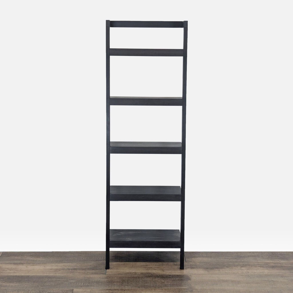 1. Tall dark mocha Crate & Barrel bookshelf with five shelves, featuring a space-saving, modular design.