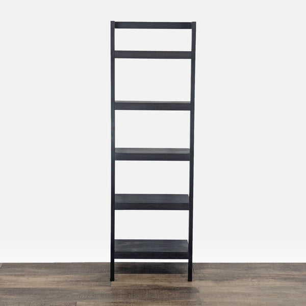1. Tall dark mocha Crate & Barrel bookshelf with five shelves, featuring a space-saving, modular design.