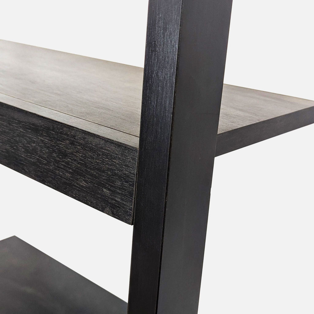 3. Close-up of Crate & Barrel bookshelf, showing solid mahogany construction and dark mocha veneer finish.