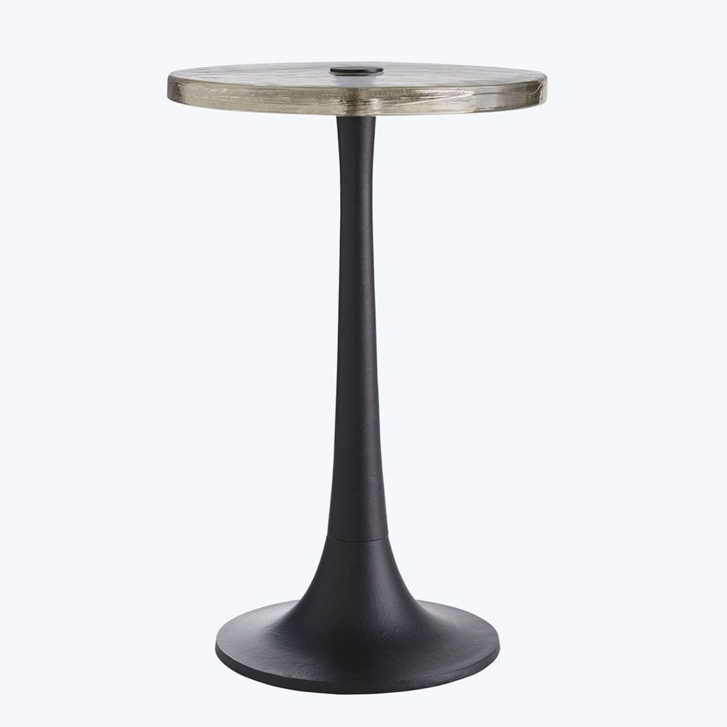 1. Side table by Arteriors Home featuring a cast glass top with organic texture and modern tulip-shaped iron base.