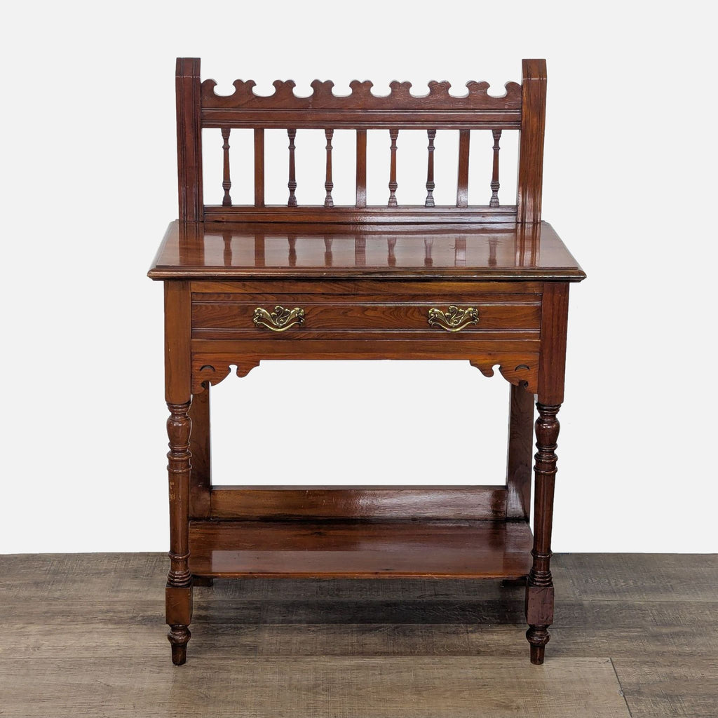 1. Reperch side and console table with a decorative back rail, turned legs, brass handles, and lower shelf.  