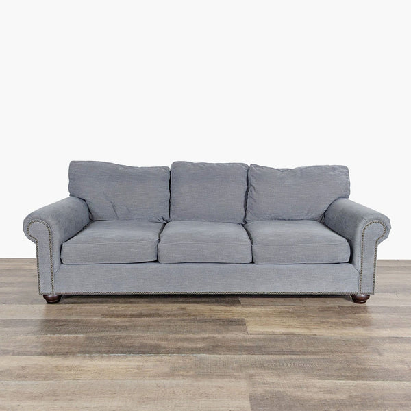 1. Pottery Barn 3-seat sofa with fabric upholstery, rolled arms, and nailhead trim, shown from the front.