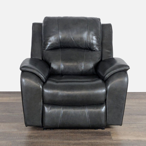 Front view of Living Spaces Lounge category power recliner with power headrest in black leather.