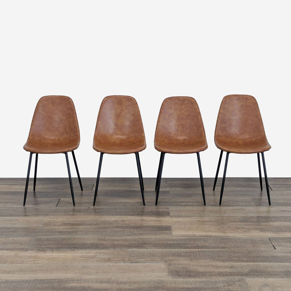 Four brown Reperch dining chairs with black legs arranged side by side on a wooden floor.