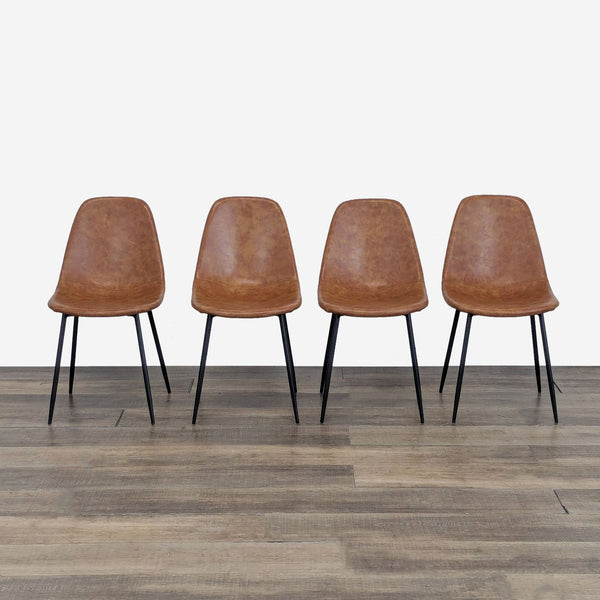 Four brown Reperch dining chairs with black legs arranged side by side on a wooden floor.