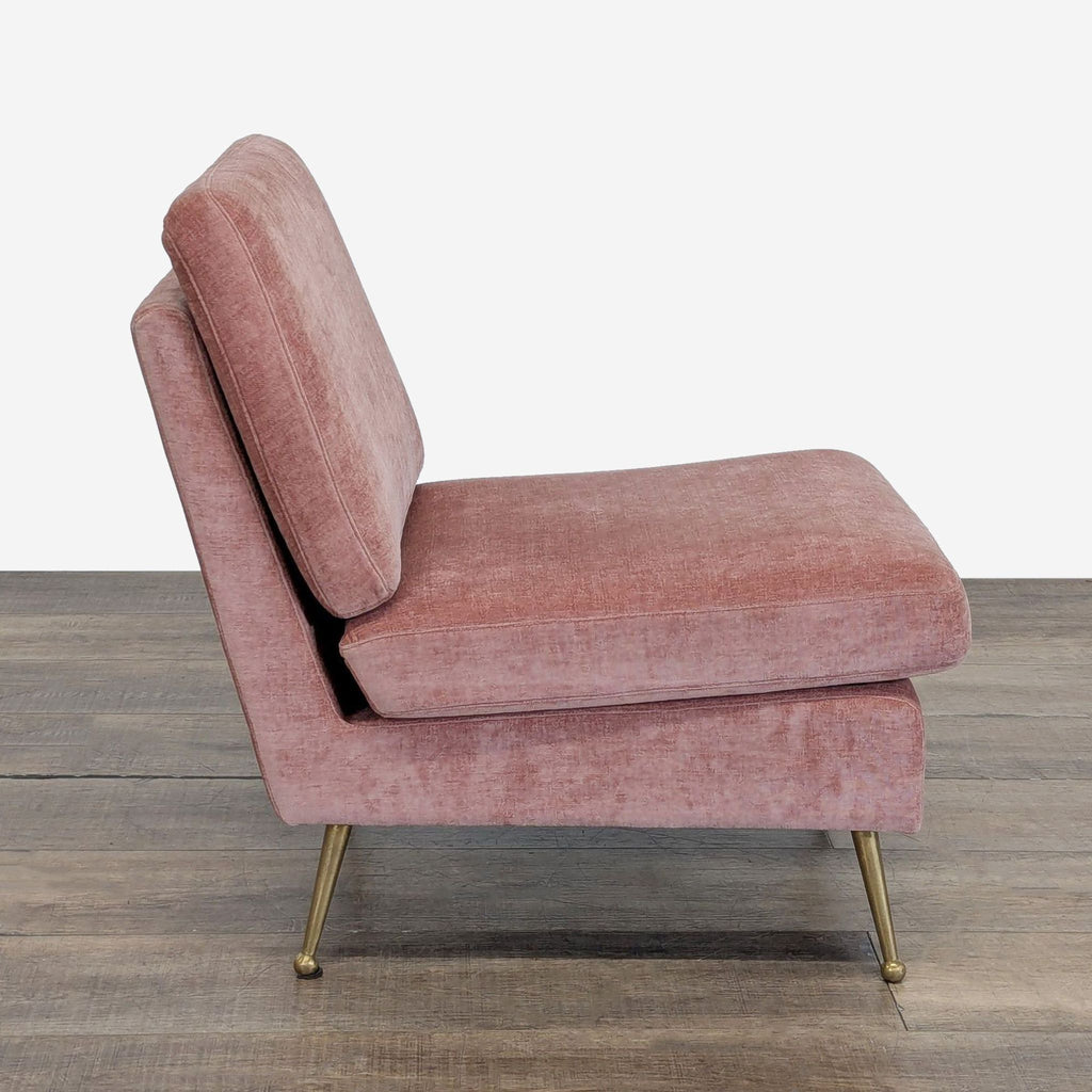 2. Side view of MXM Lounge chair in dusty pink velvet with slim gold tone metal legs.