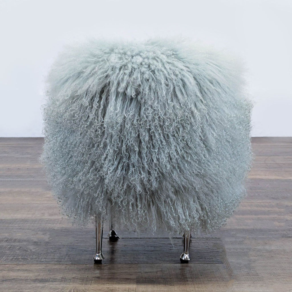 Interlude Home bench featuring plush ivory sheepskin and modern metal legs.  