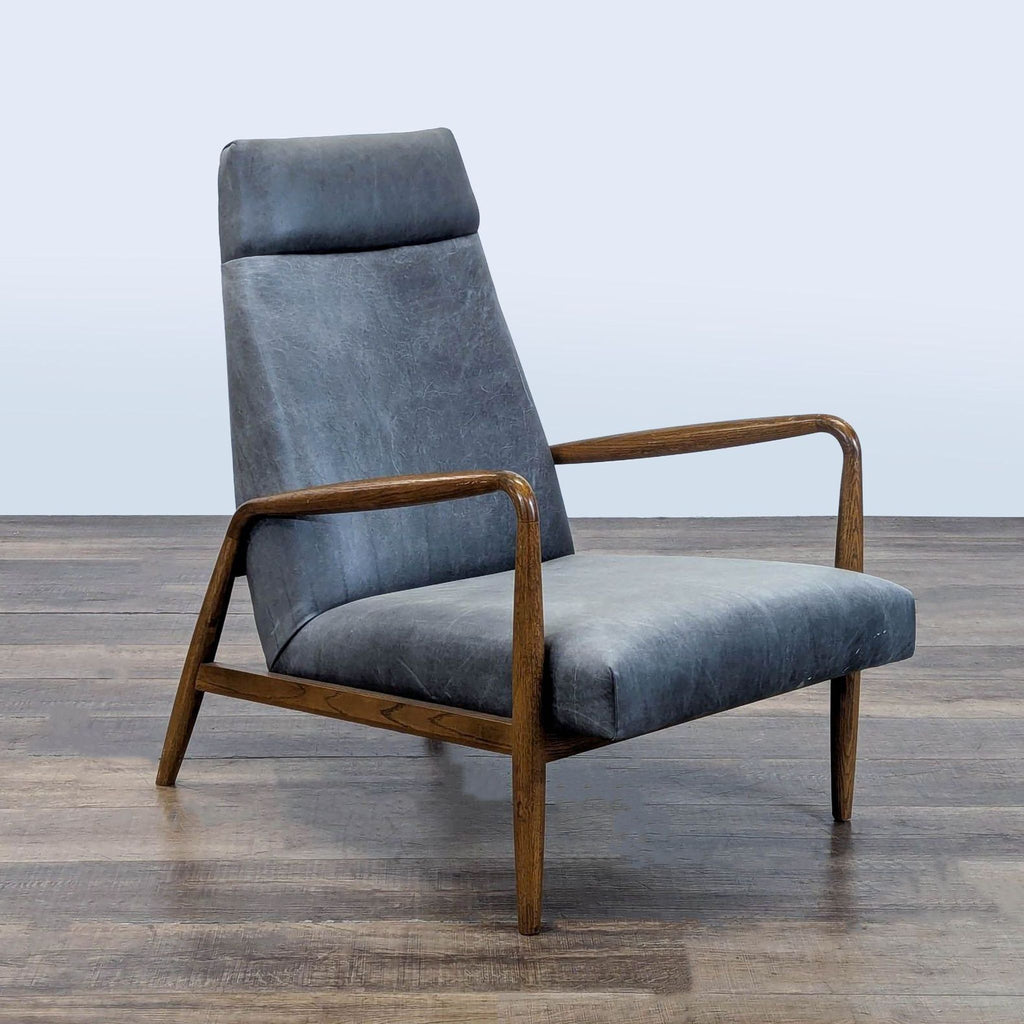 3. Angled view of a Reperch lounge chair featuring high back, sculpted wooden arms, and mid-century modern style.