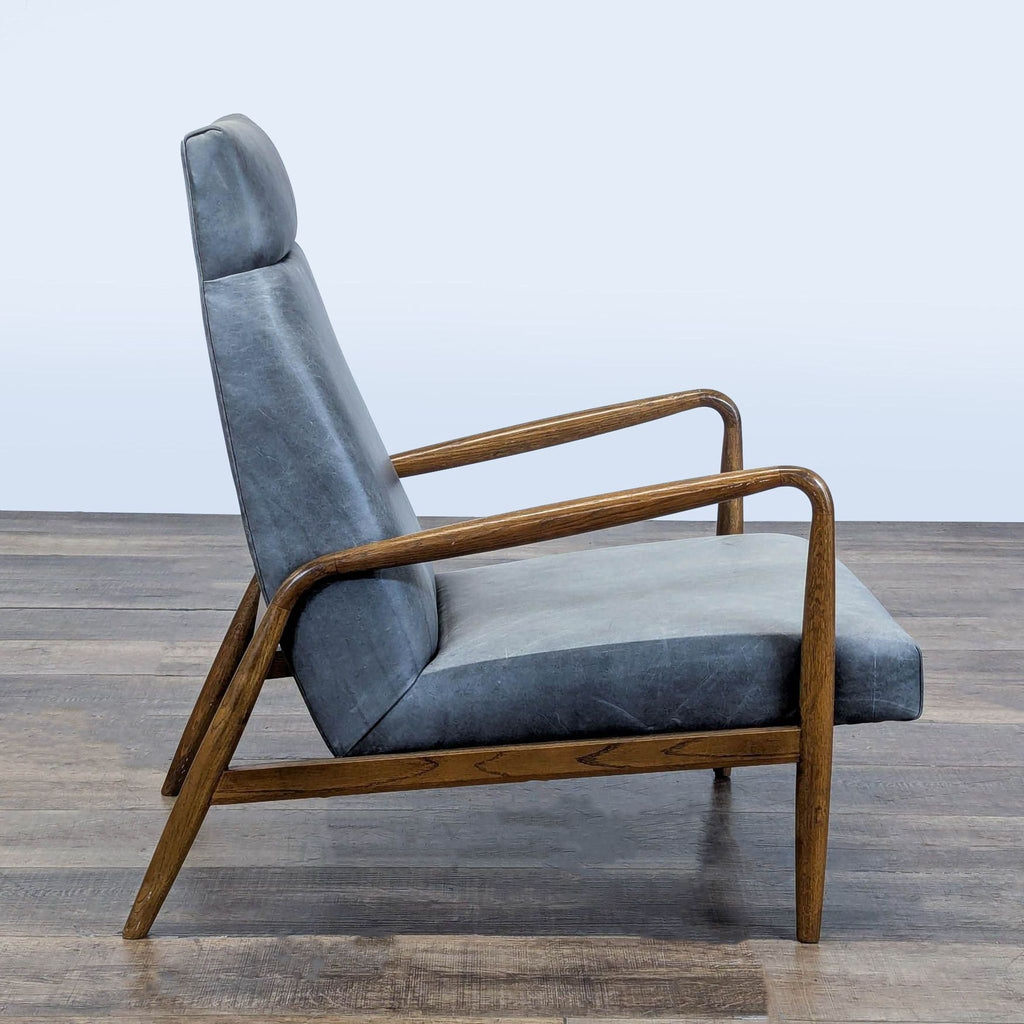 2. Side profile of a Reperch lounge chair, showing high backrest and angled wooden arms in mid-century style.