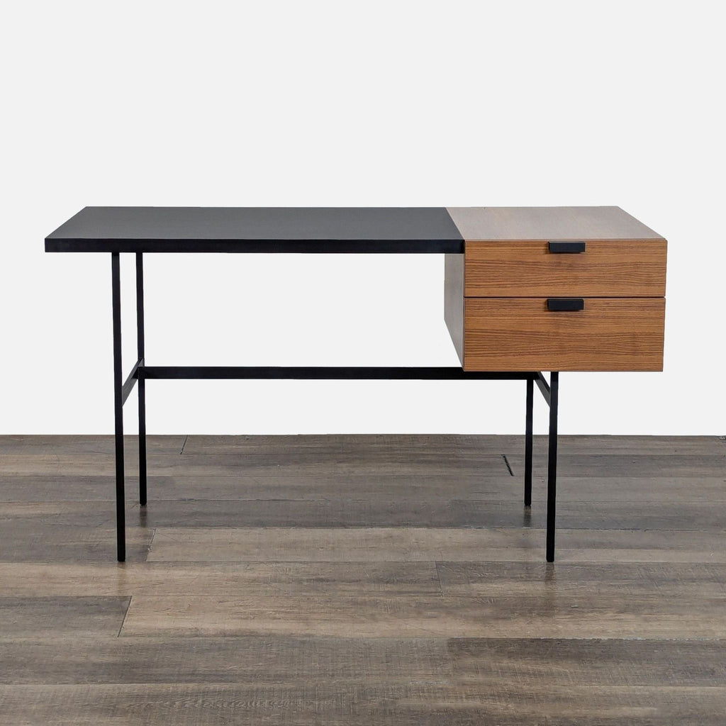 1. Modern Ligne Roset desk with black FENIX laminate top, black steel base, and two walnut veneer drawers.