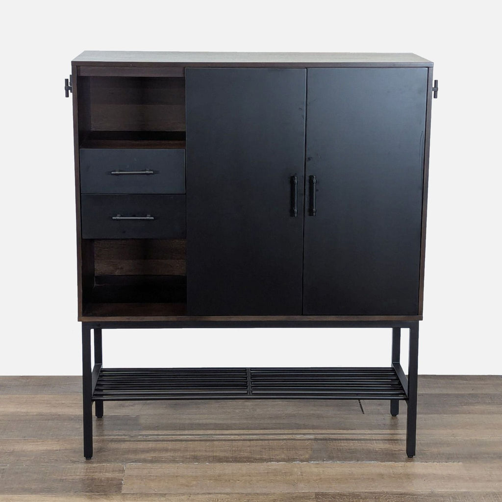 1. Modern acacia wood cabinet with black doors, two drawers, cubbies, and removable side hooks by Crate & Barrel.
