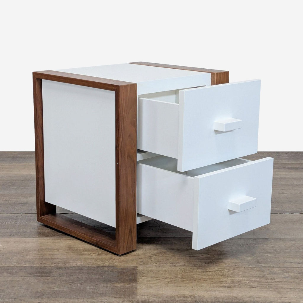 2. Side view of Ducduc oak and white end table showing both drawers open for storage access.  