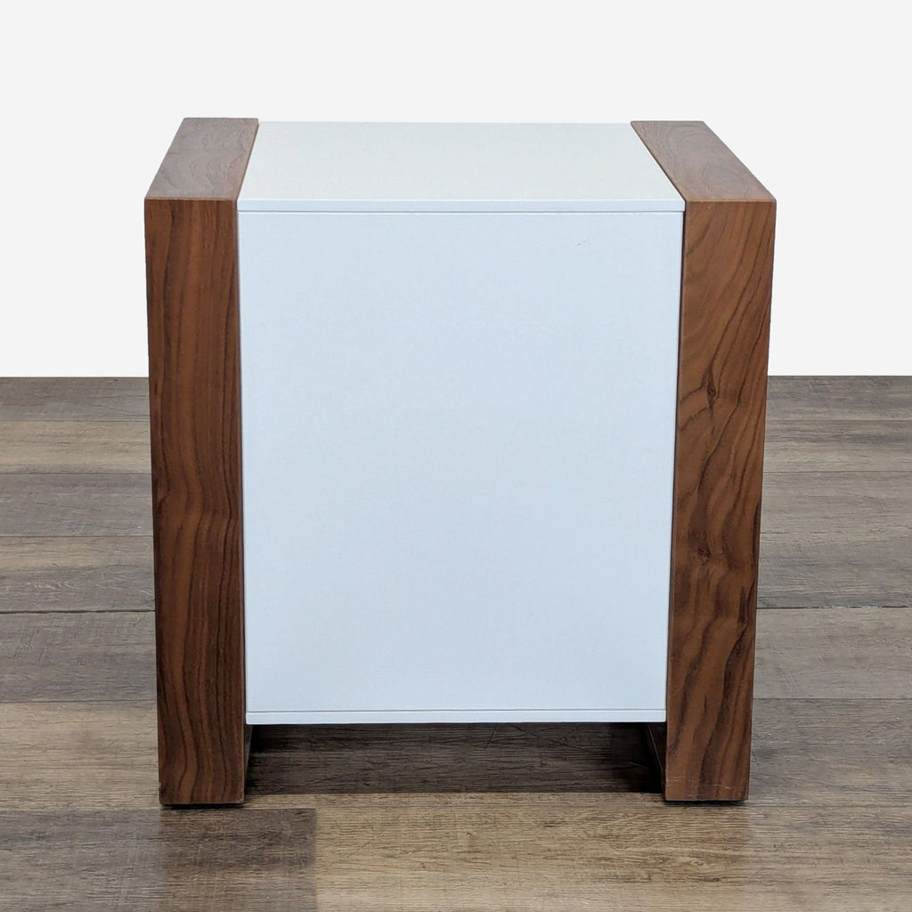 3. Rear view of Ducduc children's end table in oak and white, highlighting simple and sturdy build.