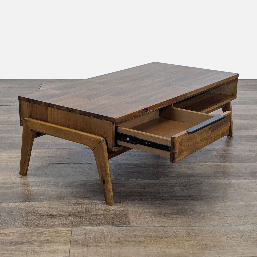 3. Angled view of Scandinavian coffee table with open storage shelf and a single pull-out drawer, Acacia wood.