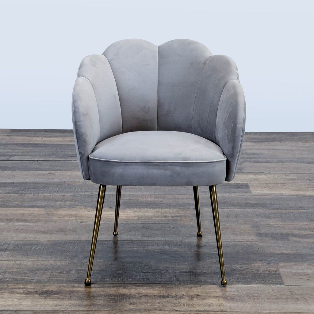 Front view of a gray velvet accent chair with brushed gold steel legs, by TOV Furniture.  