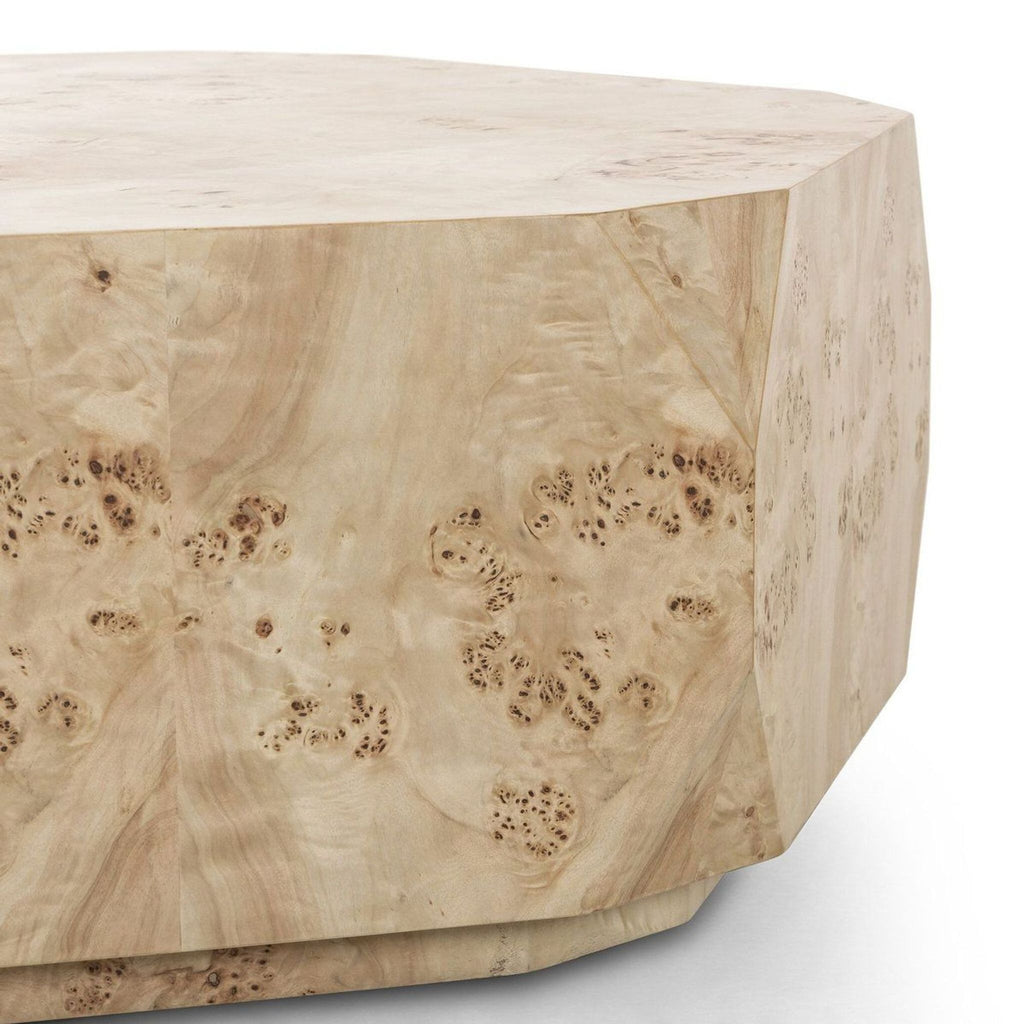 3. Angled closeup of the Reperch coffee table’s light poplar burl veneer and geometric plinth base design.