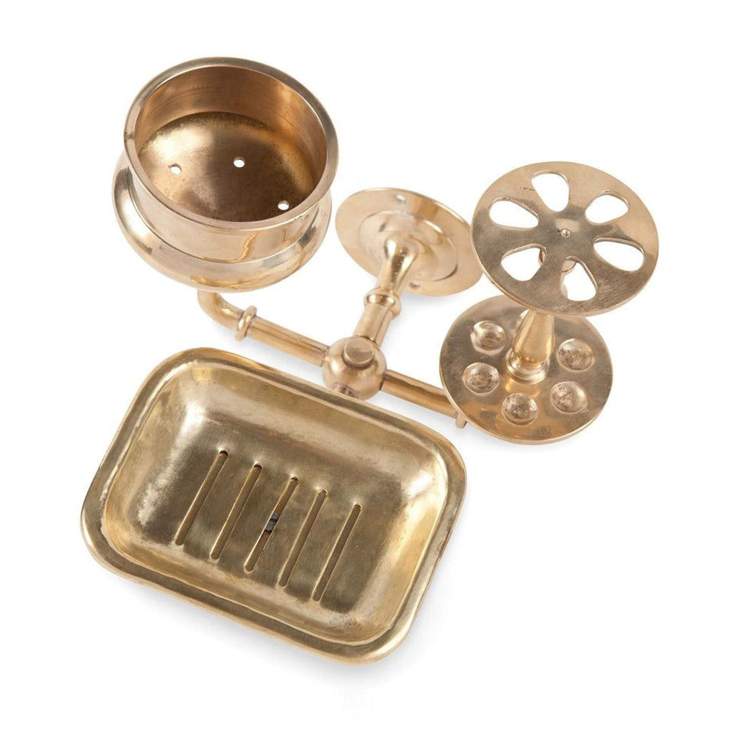 2. Sir/Madam brass bathroom rack with holders for soap, cup, and multiple toothbrushes, shown empty on white.