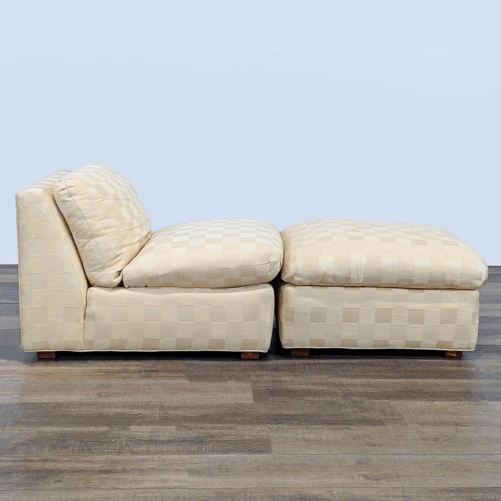 2. Side view of Reperch cream lounge chair and matching ottoman with comfortable checkered pattern.