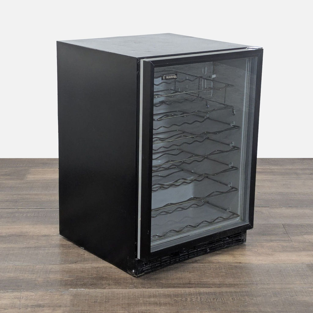 Marvel compact wine cooler with black exterior and glass door, showing metal racks for bottles and cans.