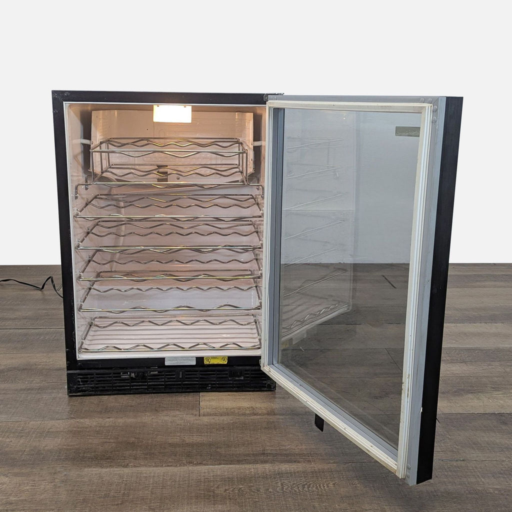 Marvel wine refrigerator open to display interior racks and clear door, designed for organized bottle storage.