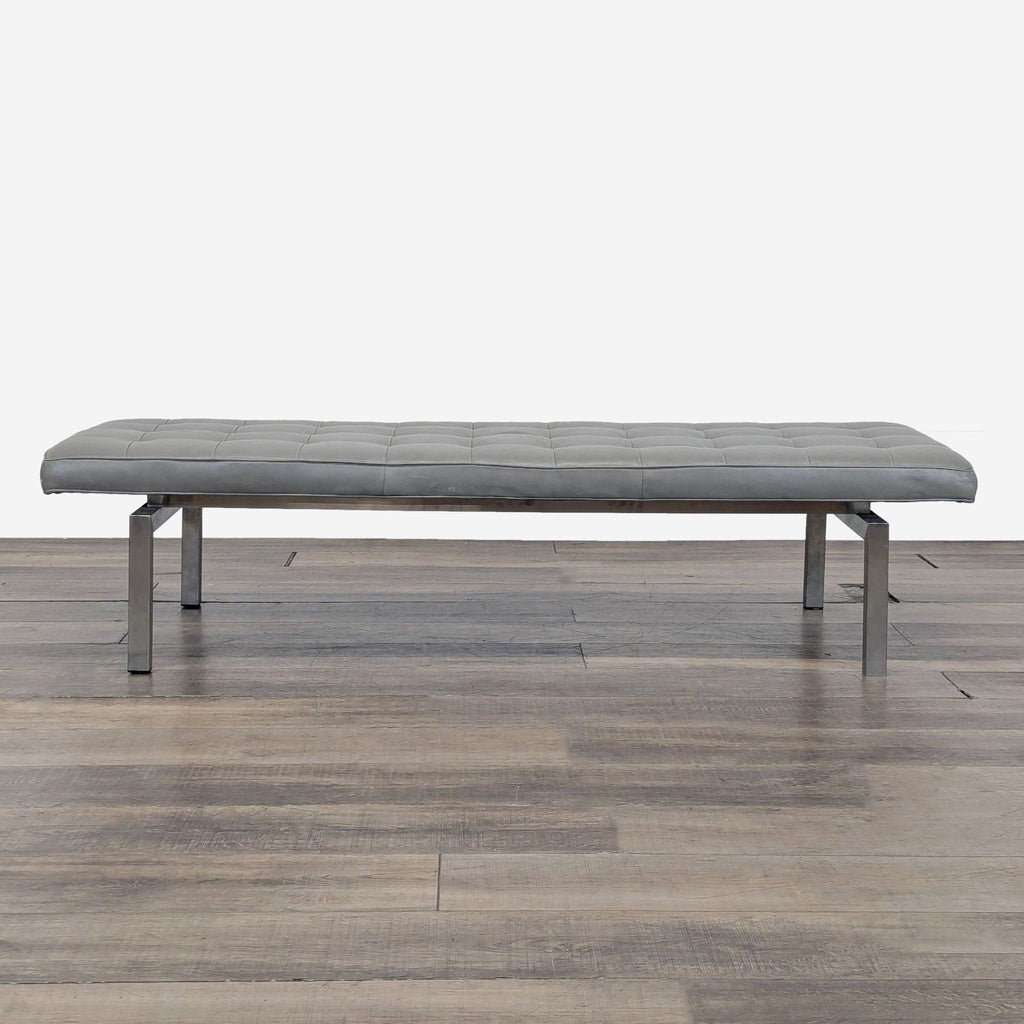 1. Modern HD Buttercup bench with grey tufted leather cushion and sleek metal legs, shown on wood flooring.