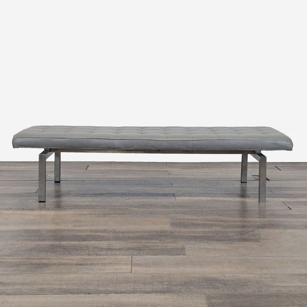 1. Modern HD Buttercup bench with grey tufted leather cushion and sleek metal legs, shown on wood flooring.
