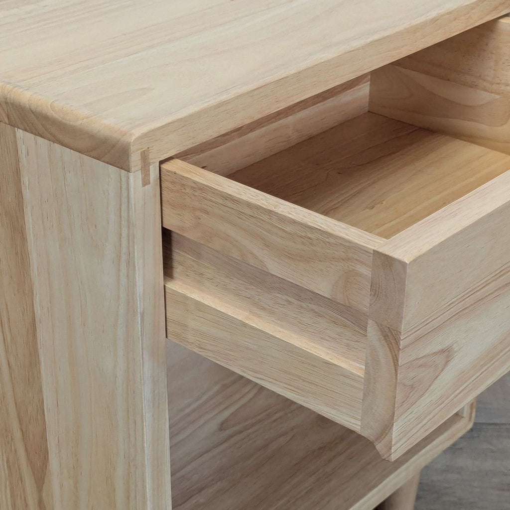 3. Close-up of the Thuma end table drawer, highlighting the smooth wooden construction and joinery details.