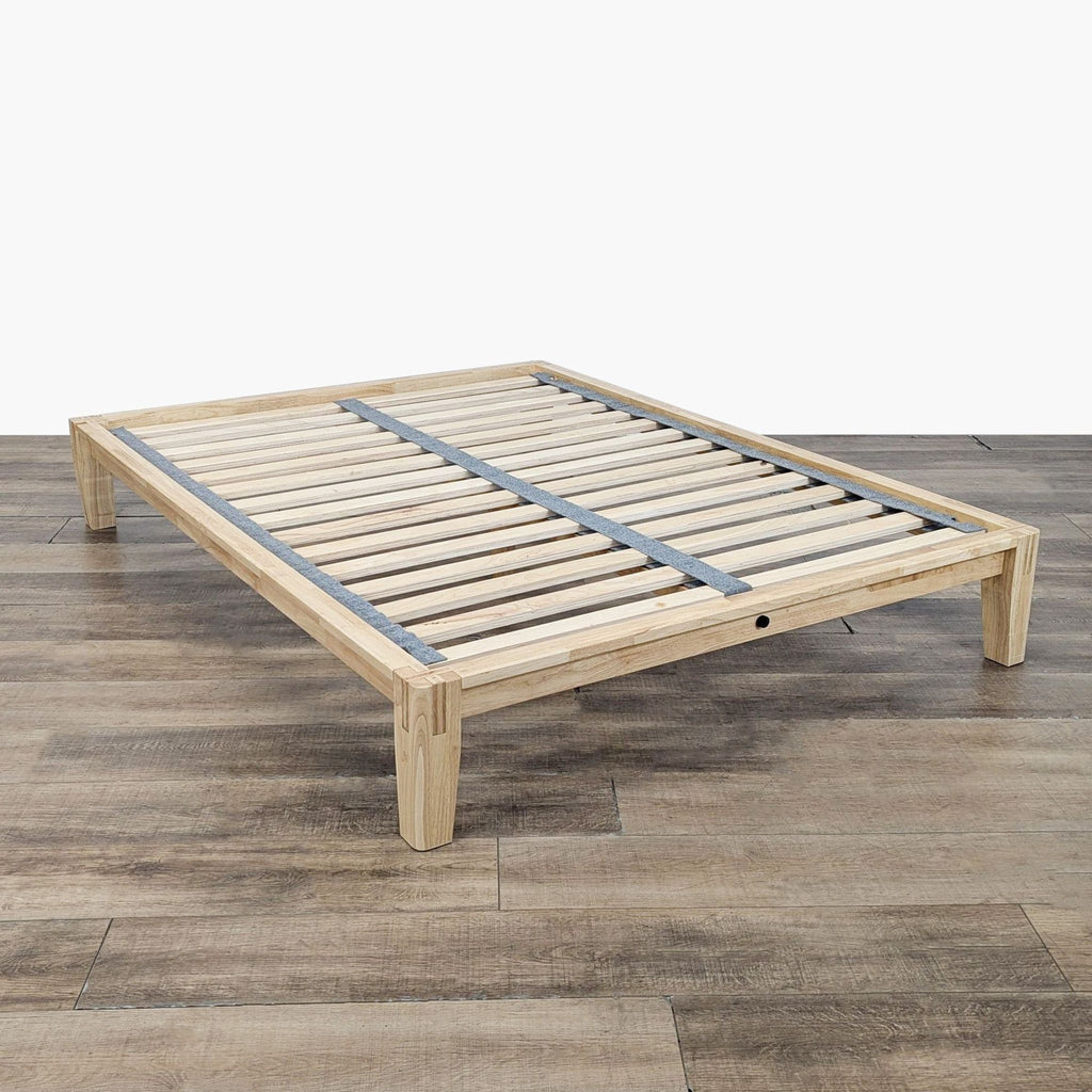 2. Thuma wooden platform bed frame with slats and Japanese joinery, brand frame viewed from an angle.