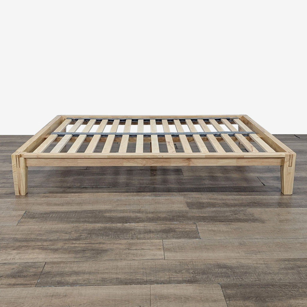 3. Minimalist Thuma bed frame with wooden slats and Japanese joinery, category frame, seen from the side.