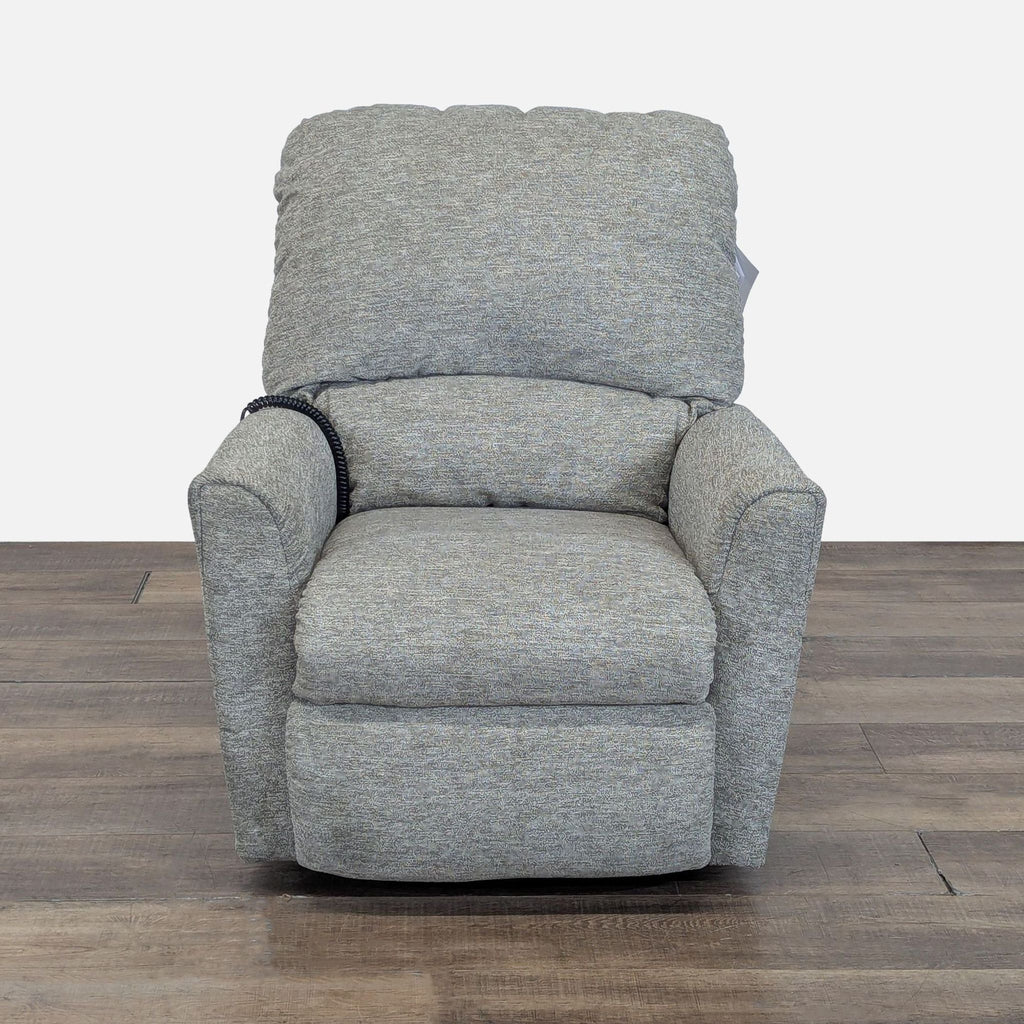 Front view of a La-Z-Boy lounge chair with plush back, curved arms, and a wired controller for easy reclining.  
