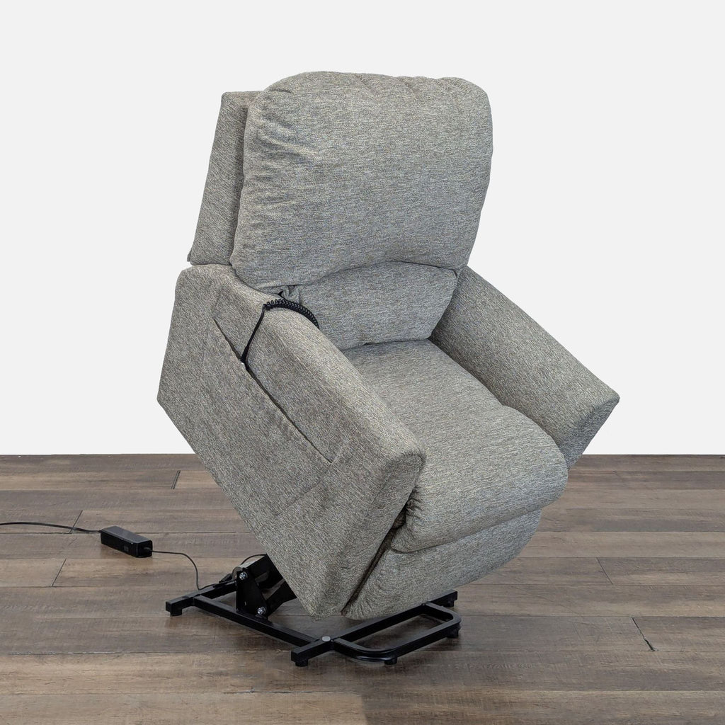 Side view of a La-Z-Boy power lift lounge chair elevating, showing legrest, side pocket, and supportive cushioning.  
