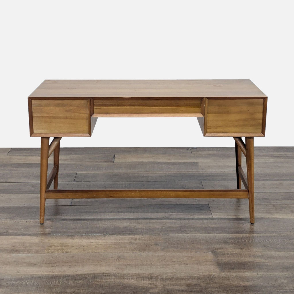 3. Back view of the solid eucalyptus and acacia veneer desk by West Elm, highlighting its clean lines.
