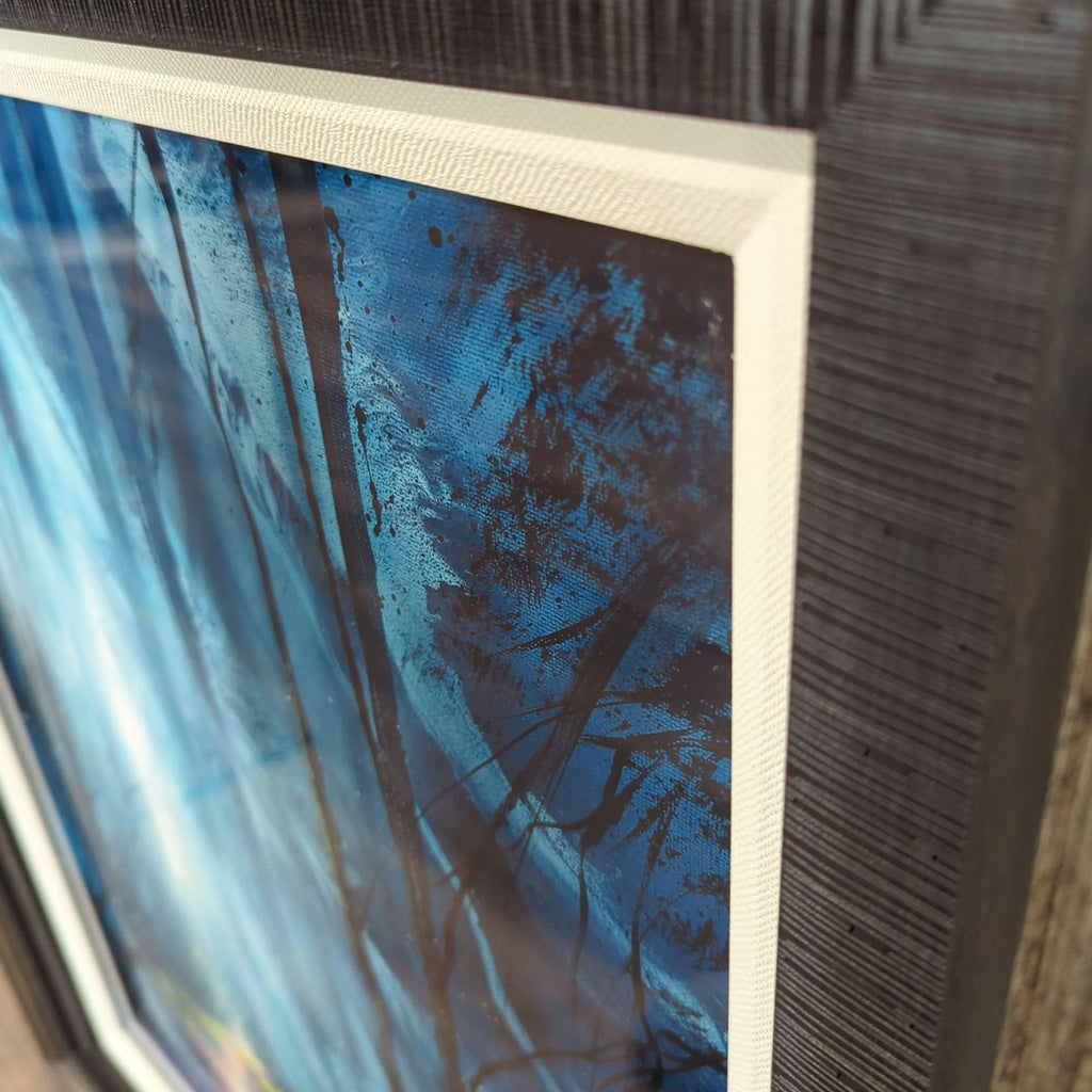 2. Close-up of the framed Ashton Howard aluminum print, showing detail and textured frame edge.